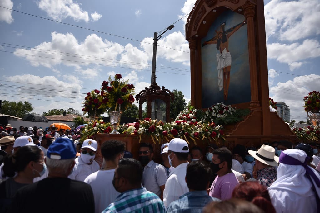 Catholic parishioners carry the image of the Sangre de Cristo in Managua